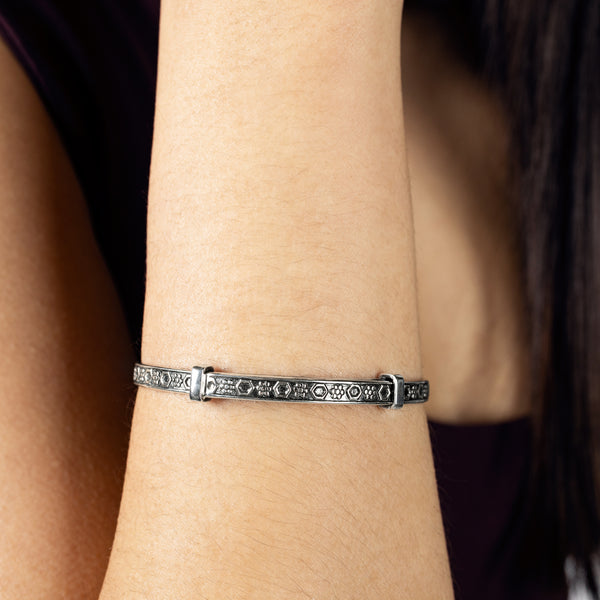 Cinching Belt Bangle in Antiqued Silver - Geo Floral Pattern